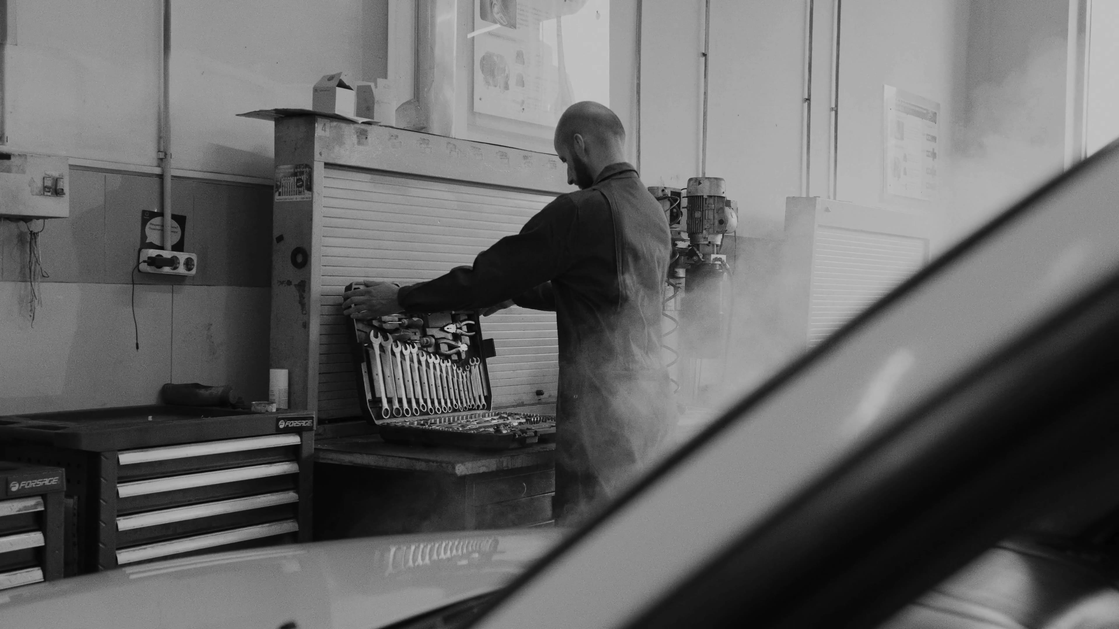 A tradesman at work in a workshop